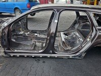 Próg lewy SŁUPEK ŚRODKOWY B AUDI A6 C7 kombi 5d brązowy LY8Z