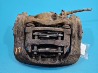 Zacisk przód lewy Vw Transporter T4 2.4d