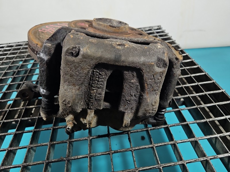 Zacisk przód lewy Nissan Primastar 01-14 2.0 dci