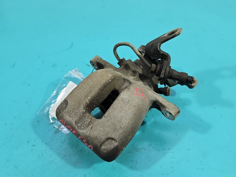 Zacisk tył lewy Skoda Octavia II 2.0 tdi (BKD) kombi