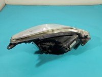 Reflektor lewy lampa przód Opel Corsa D EUROPA