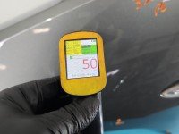 Błotnik przód lewy Opel Astra V K grafitowy z10a