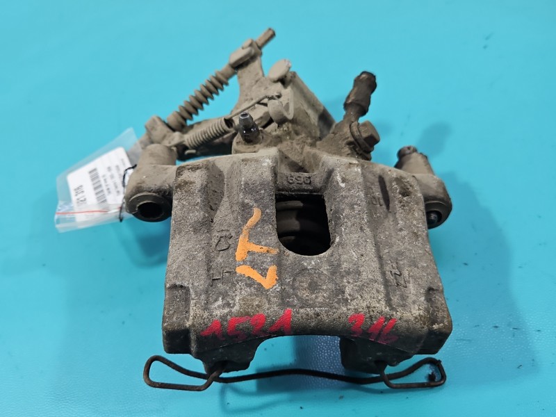 Zacisk tył lewy Opel Vectra C 2.2 DTI kombi