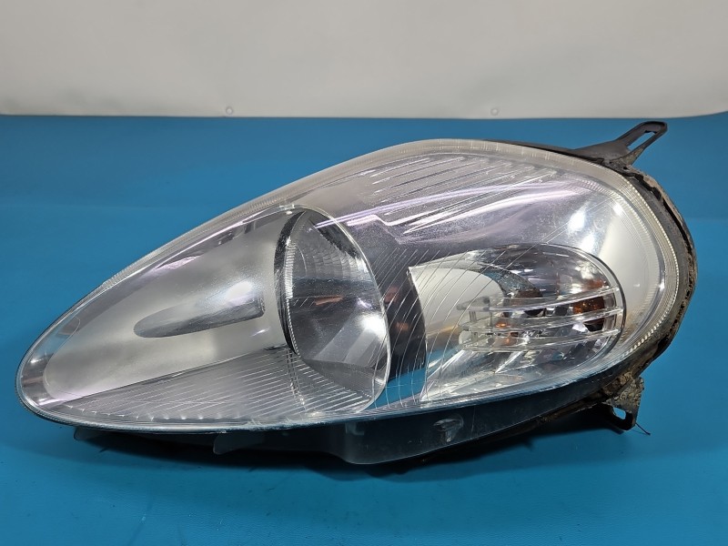 Reflektor lewy lampa przód Fiat Grande Punto EUROPA