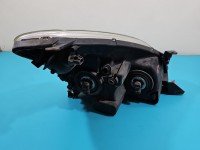 Reflektor lewy lampa przód Toyota Corolla Verso II EUROPA