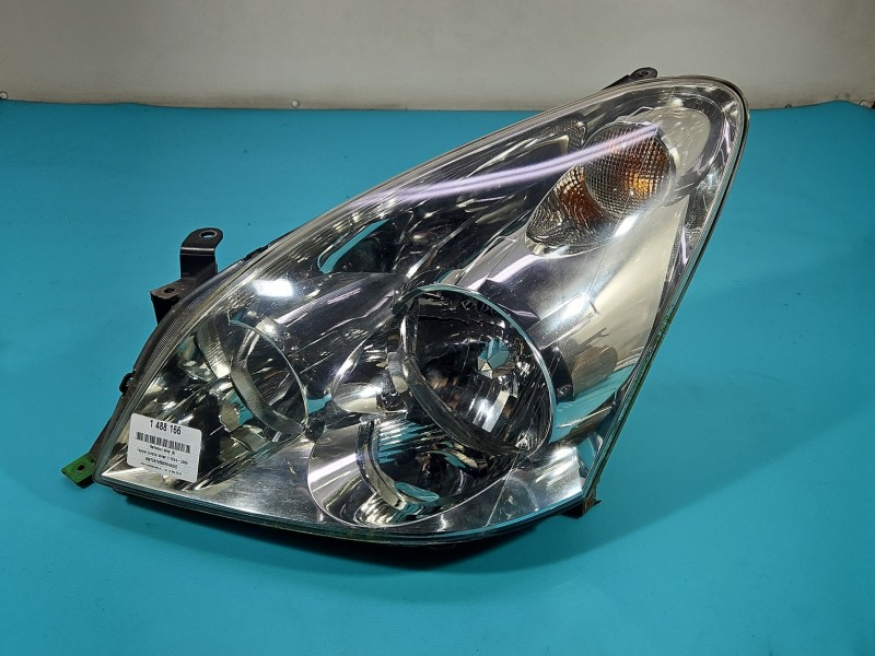 Reflektor lewy lampa przód Toyota Corolla Verso II EUROPA