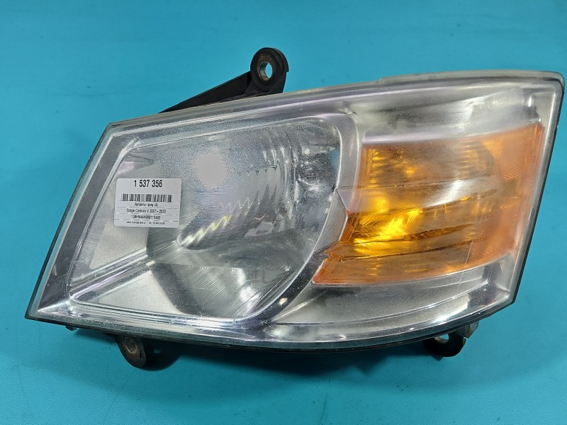 Reflektor lewy lampa przód Dodge Caravan V 07-20 EUROPA