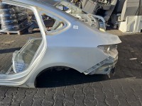 Błotnik tył lewy ćwiartka Opel Astra IV J Z176 sedan