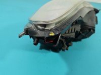 Reflektor lewy lampa przód Opel Corsa D EUROPA