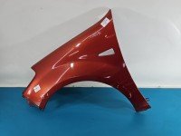 Błotnik przód lewy Dacia Sandero I 08-12 bordowy TEB76