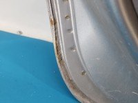 Drzwi tył lewe Nissan Almera N16 HB 5d srebrny
