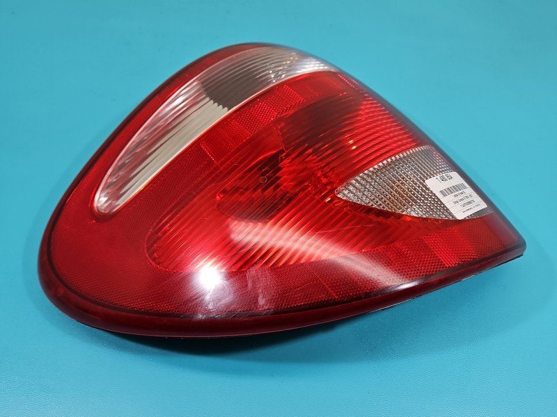 Lampa tył lewa Producent części: Dodge, klejona Dodge Caravan IV 00-07 HB