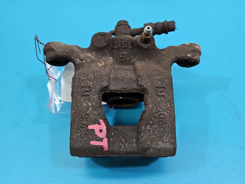 Zacisk tył prawy Nissan Qashqai I J10 06-13 1.6 16V HB