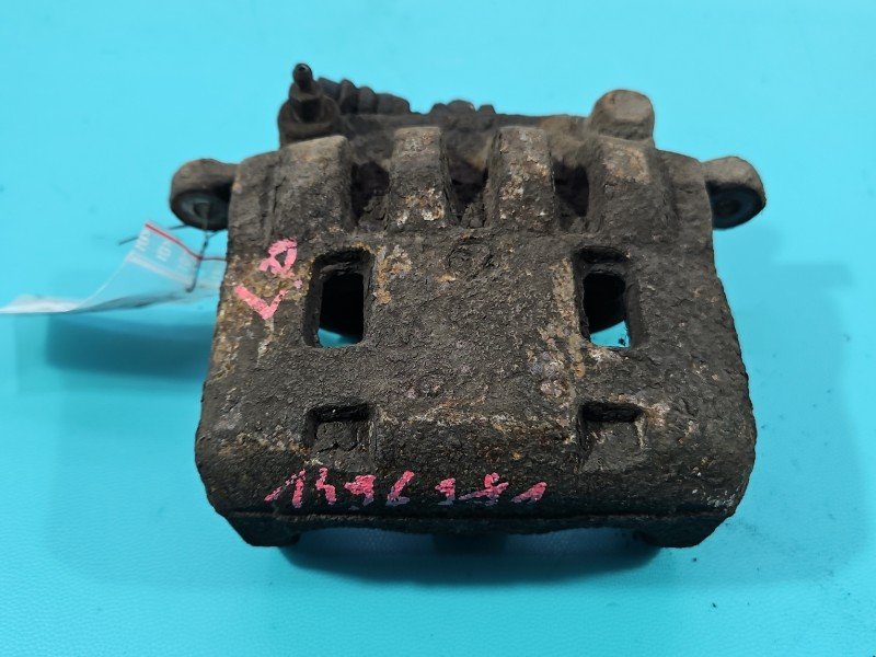 Zacisk przód lewy Subaru Legacy IV 2.0 boxer