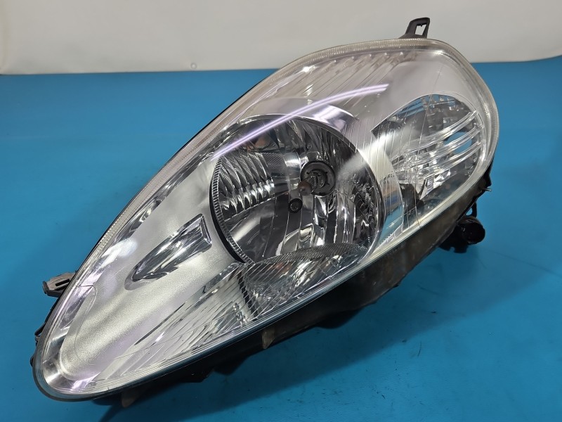Reflektor lewy lampa przód Fiat Grande Punto EUROPA