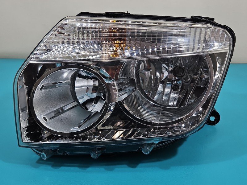 Reflektor lewy lampa przód Dacia Duster I 10-18 EUROPA