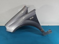 Błotnik przód lewy Fiat Grande Punto srebrny 595/A