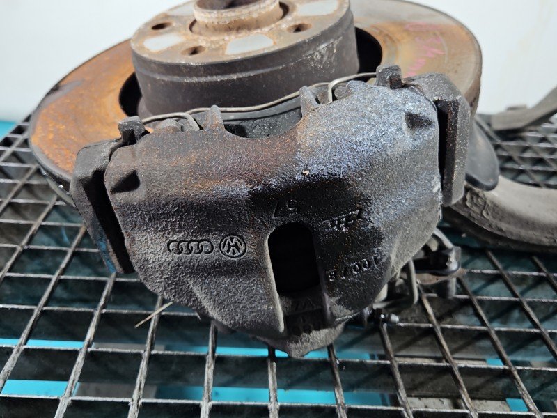 Zacisk przód lewy Audi A6 C6 2.0 tdi (BRE)