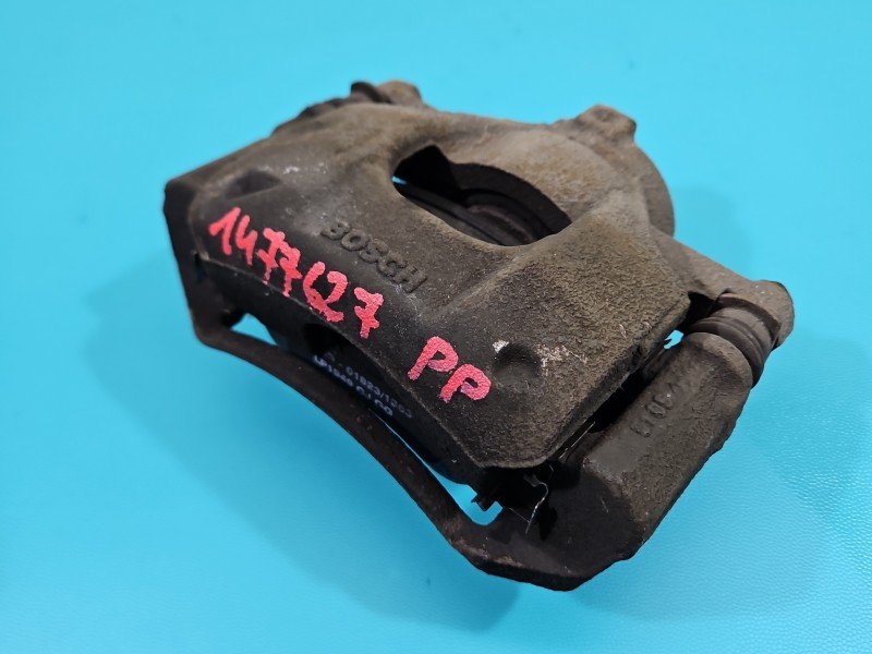 Zacisk przód prawy Toyota Aygo II 14-22 1.0 vvti (1KR) Zacisk przód prawy Toyota Aygo II 14-22 1.0 vvti (1KR)