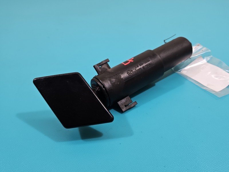 Spryskiwacz reflektora lewy Bmw e90 7179311 xenon