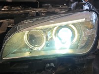 Reflektor lewy lampa przód BMW X1 E84 EUROPA 90018090, 7290239