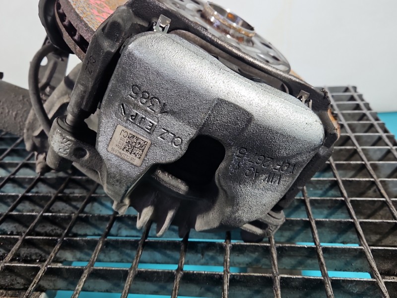 Zacisk przód lewy Skoda Superb IV 2.0 TDI DXPA