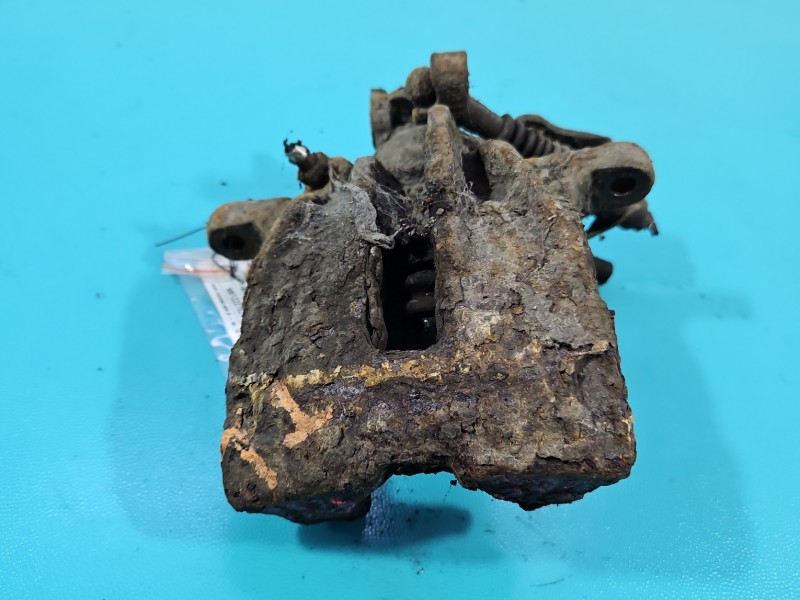 Zacisk tył lewy Vw Transporter T4 1.9 TD HB