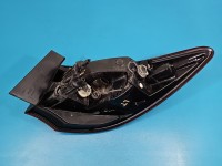 Lampa tył lewa błotnika Opel Astra IV J sedan EUROPA 25870153