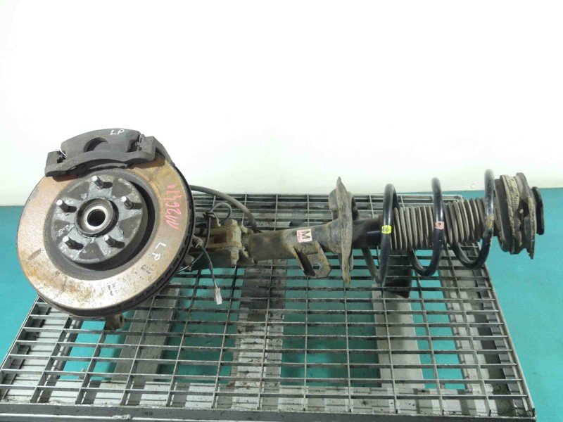 Amortyzator przód lewy przedni Nissan X-trail II T31