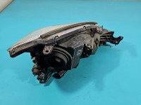 Reflektor lewy lampa przód Mitsubishi Lancer VII EUROPA