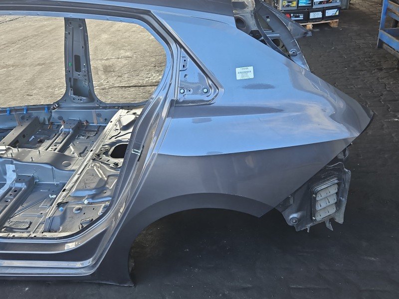 Błotnik tył lewy Opel Astra VI L ćwiartka szary EVL