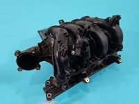Kolektor ssący Opel Astra IV J 55573811 1.6 16V