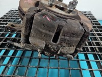 Zacisk przód lewy Nissan Qashqai I J10 06-13 1.6 16V (HR16DE)