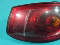Lampa tył lewa Producent części: FIAT, naderwane mocowanie / Z LISTWĄ ŻARÓWKOWĄ Fiat Bravo II HB