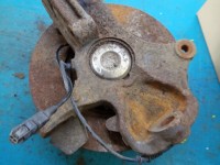 Zacisk tył lewy Mazda Premacy 2.0 ditd HB