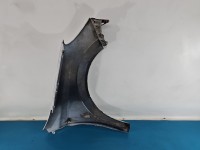 Błotnik przód lewy Opel Astra III H biały Y474