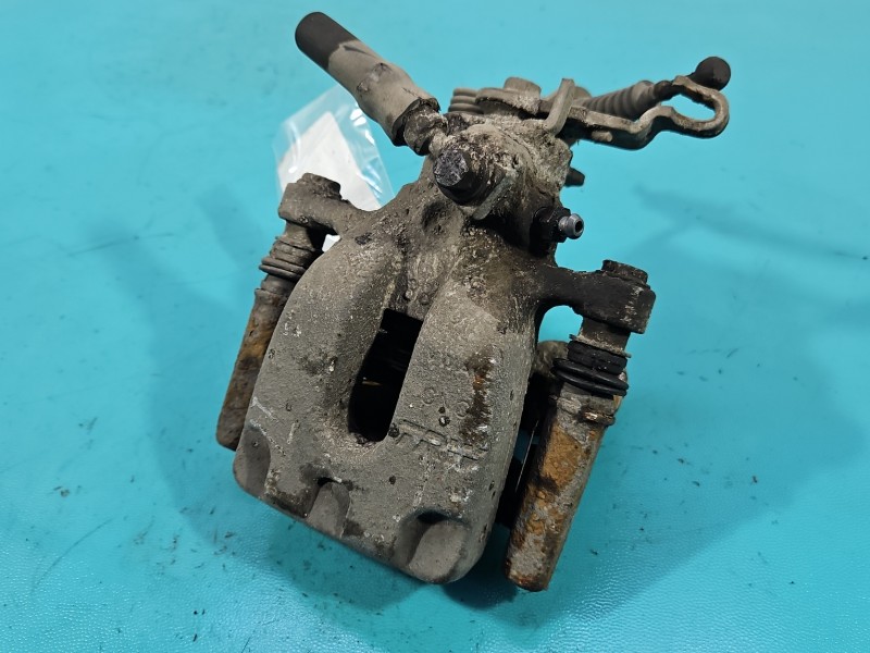 Zacisk tył lewy Skoda Octavia III 2.0 tdi HB