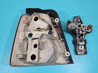 Lampa tył prawa Volkswagen, Uszkodzony zatrzask trzymający boczną osłonę Vw Touran I HB