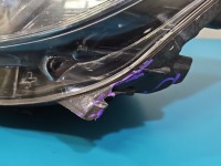 Reflektor lewy lampa przód Opel Astra IV J EUROPA 13253650