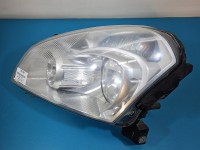 Reflektor lewy lampa przód Nissan Qashqai I J10 06-13 EUROPA 26060-JD90B