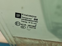 Szyba drzwi przód prawa Opel Astra IV J HB