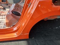 Błotnik tył lewy Opel Corsa F ćwiartka pomarańczowy KVH