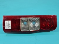Lampa tył lewa Producent części: FORD, BEZ WKŁADU TYC, RYSY NA KLOSZU Ford Transit MK7 06-13 HB