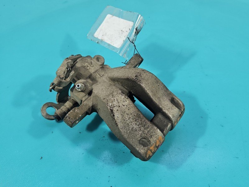 Zacisk tył lewy Fiat Bravo II 1.9 jtd HB