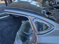 Błotnik tył lewy Opel Astra IV J ćwiartka beżowy Z41W