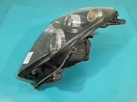 Reflektor prawy lampa przód Opel Astra III H EUROPA 93190391