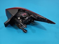 Lampa tył lewa Opel Astra V K kombi Pęknięte mocowanie trzymający wkład VALEO KOMBI W BŁOTNIK EUROPA