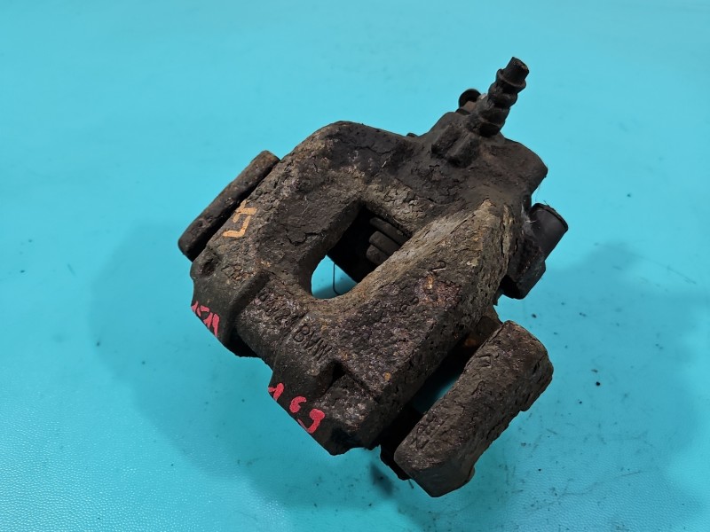 Zacisk tył lewy BMW F01 3.0d sedan