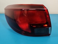 Lampa tył lewa Opel Astra V K kombi Pęknięte mocowanie trzymający wkład VALEO KOMBI W BŁOTNIK EUROPA