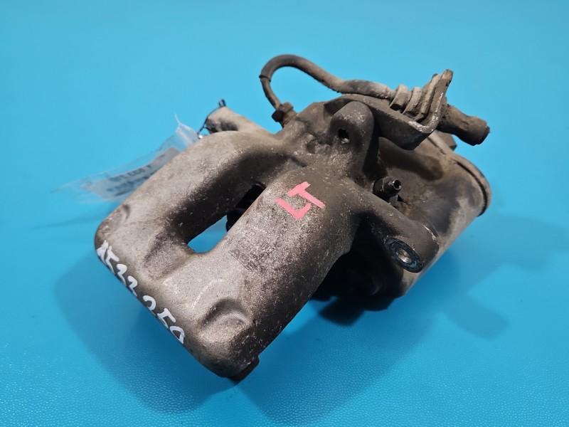 Zacisk tył lewy Vw Passat B6 2.0 tdi sedan